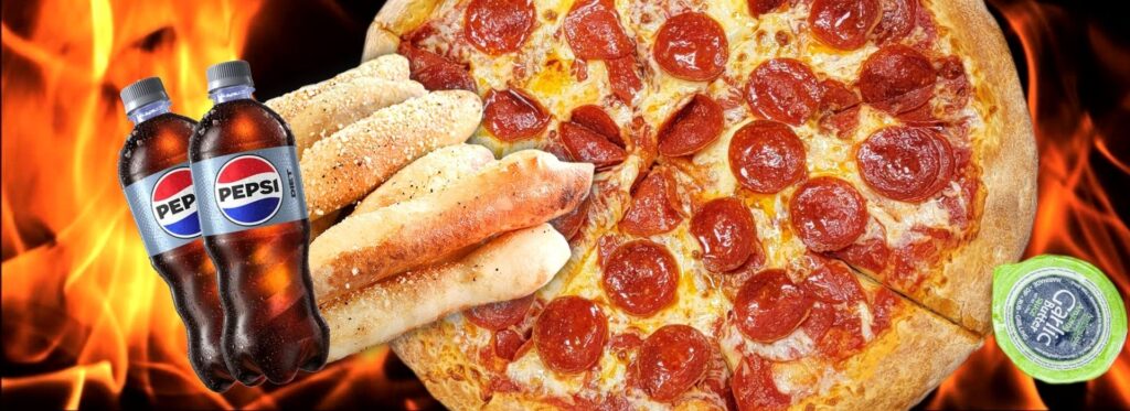 Freshly made pizza with a cold drink on the side.